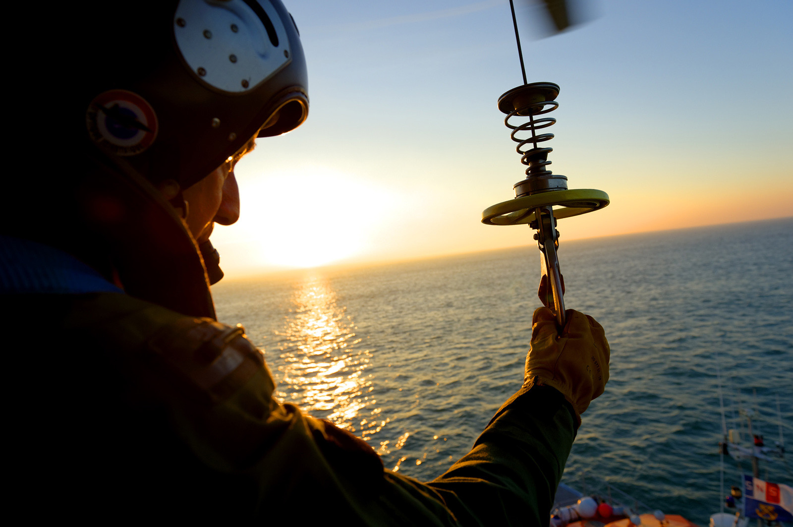 L'hélicoptère Dauphin SP (service public) de la marine constitue l'un des principaux moyens d'intervention à la disposition du CROSS pour les opérations de sauvetage en mer.L'équipage d'un Dauphin SP, c'est 6 personnes : aux 4 navigants qui sont à bord de l'appareil pour chaque mission (pilote, copilote, mécanicien de bord treuilliste et plongeur) s'ajoutent 2 techniciens, qui restent à terre et sont chargés de l'entretien de la machine. Depuis janvier 2013, au terme de 23 ans de service à Cherbourg-en-Cotentin, le Dauphin SP a cédé sa place à un nouvel appareil, plus imposant et de conception beaucoup plus récente : un EC 225.